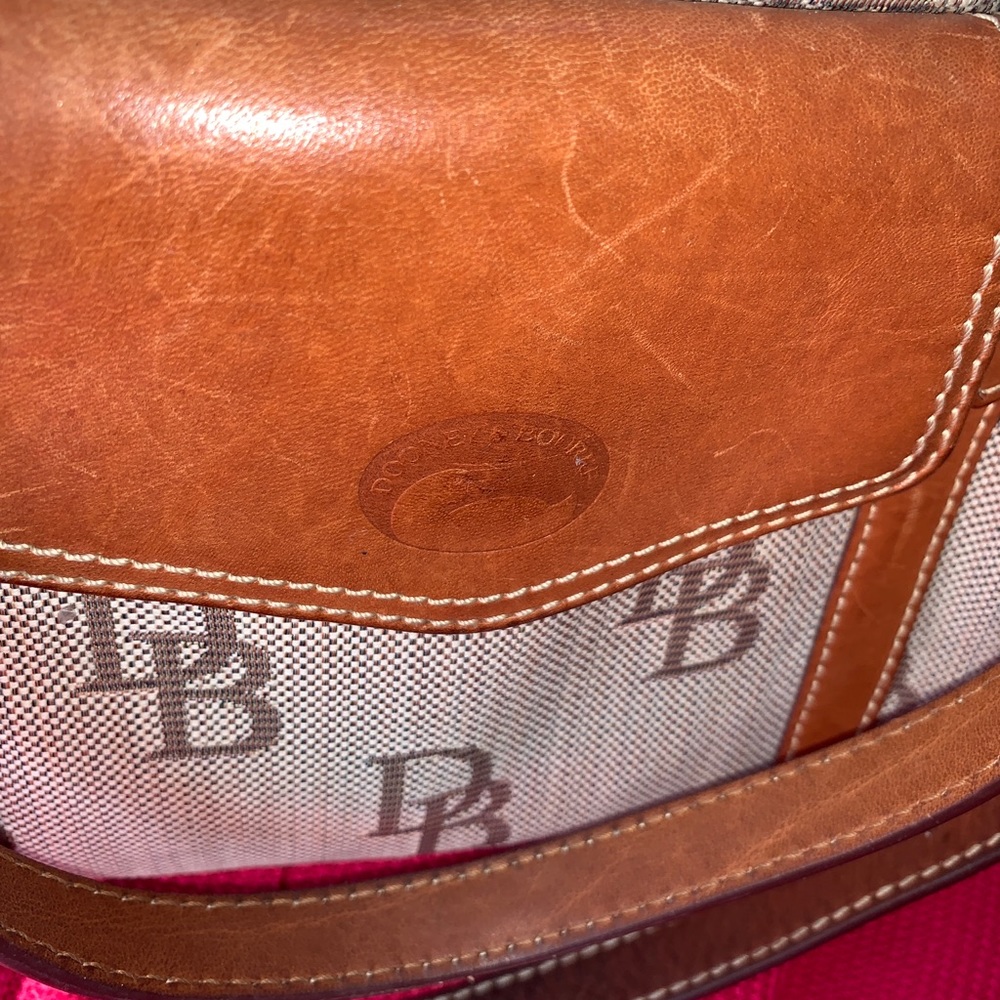 “ Authentic Dooney and Bourke Brown Mix Material Leather and Fabric.